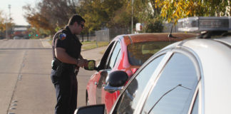 If you are walking down the road and a police officer stops you to ask you for your ID, must you show him?